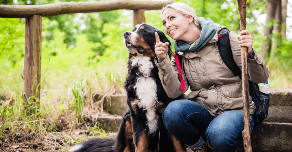 woman with dog for 'hiking with dogs' article 