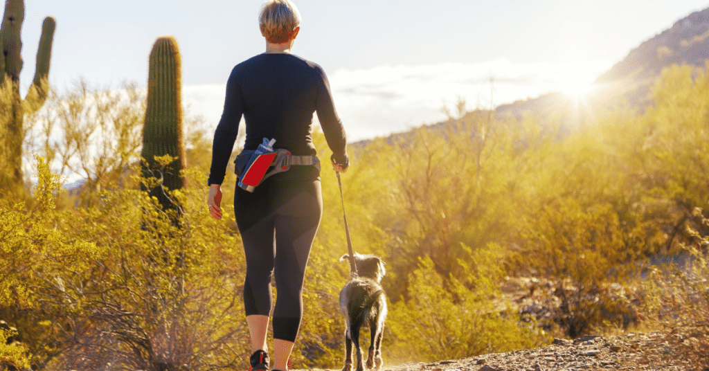 woman with dog for 'hiking with dogs' article 